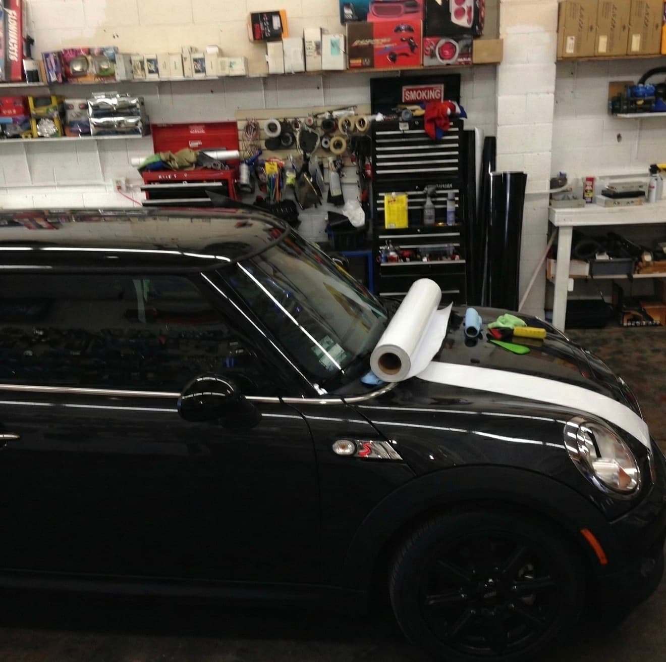 Car getting a vinyl wrap installed