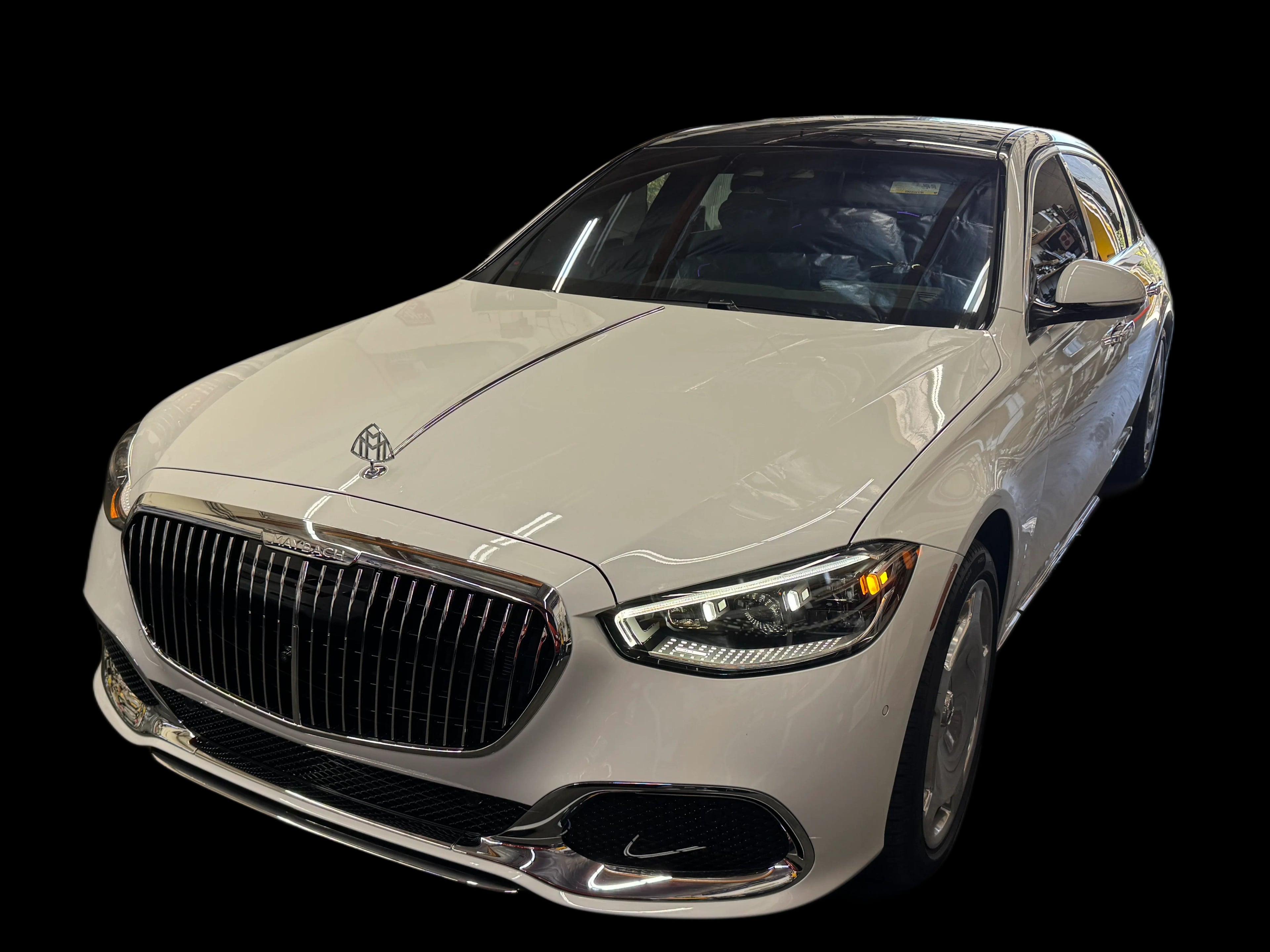 White Mercedes-Benz with window tint
